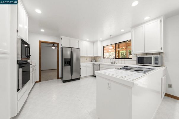 Interior, Kitchen, Pendant Lights, Recessed Lighting, Stainless Steel Appliances, Tile Countertops