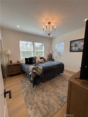 Bedroom, Chandelier, Interior, Recessed Lighting, Wood Texture Flooring