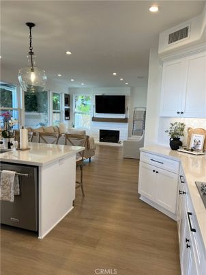 Dining room, Fireplace, Interior, Kitchen, Living room, Pendant Lights, Recessed Lighting, Wood Texture Flooring