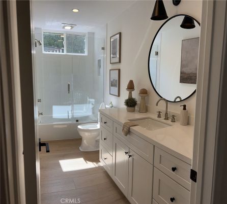 Bathroom, Dual Sink Vanities, Glass Shower, Interior, Recessed Lighting, Wood Texture Flooring