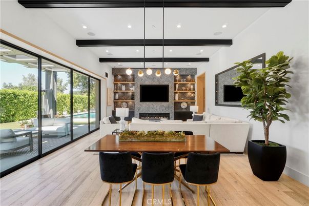 Dining room, Fireplace, Interior, Living room, Pendant Lights, Recessed Lighting, Wooden Beams, Wood Texture Flooring