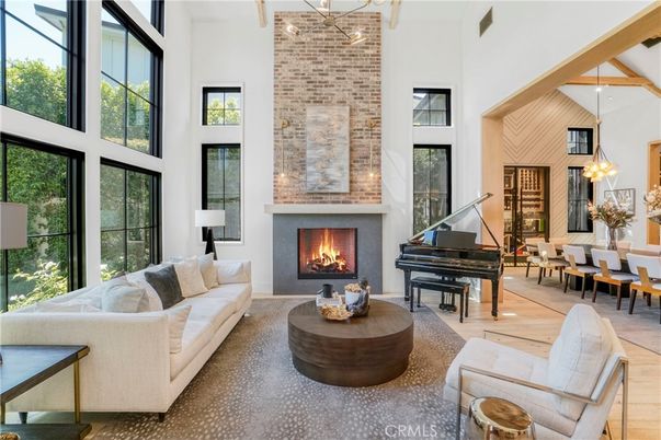 Dining room, Fireplace, Interior, Living room, Pendant Lights, Piano, Stone Walls, Wooden Beams