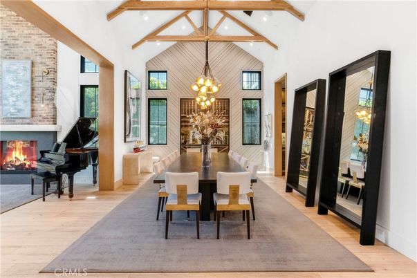 Dining room, Fireplace, Interior, Pendant Lights, Piano, Stone Walls, Wooden Beams, Wood Texture Flooring