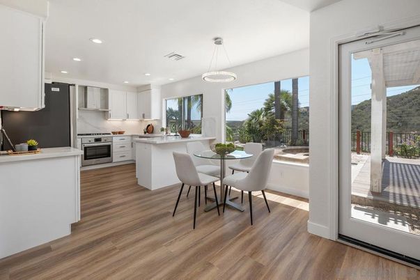 Dining room, Interior, Kitchen, Pendant Lights, Recessed Lighting, Stainless Steel Appliances, Wood Texture Flooring