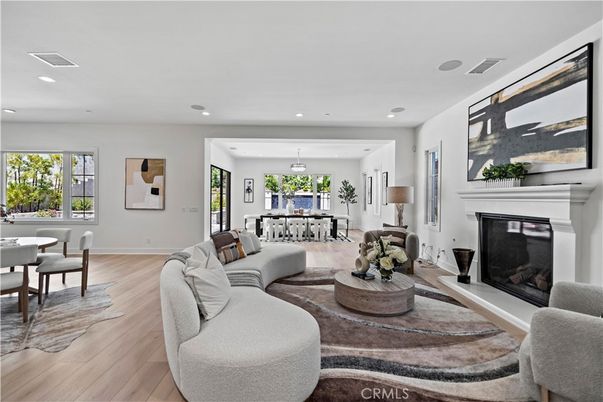 Dining room, Fireplace, Interior, Living room, Pendant Lights, Recessed Lighting, Wood Texture Flooring