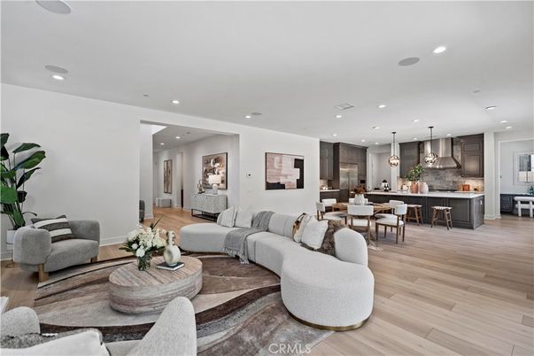 Dining room, Interior, Kitchen, Living room, Pendant Lights, Recessed Lighting, Stainless Steel Appliances, Wood Texture Flooring