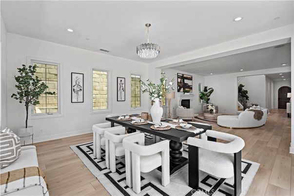 Chandelier, Dining room, Fireplace, Interior, Living room, Recessed Lighting, Wood Texture Flooring