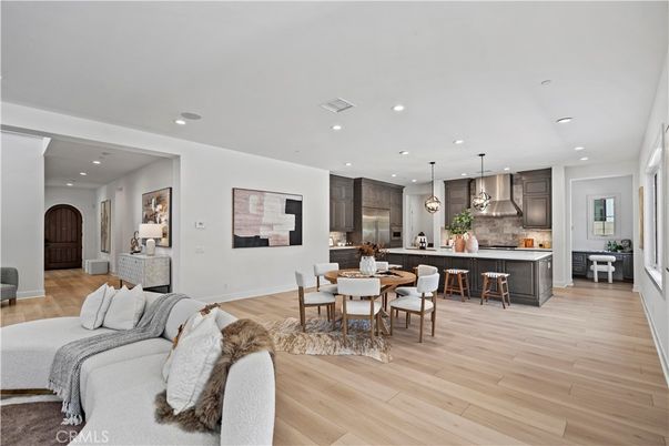 Dining room, Interior, Kitchen, Pendant Lights, Recessed Lighting, Stainless Steel Appliances, Wood Texture Flooring