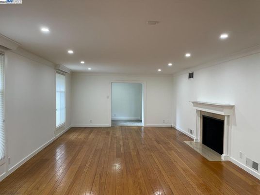 Empty room, Fireplace, Interior, Recessed Lighting, Wood Texture Flooring