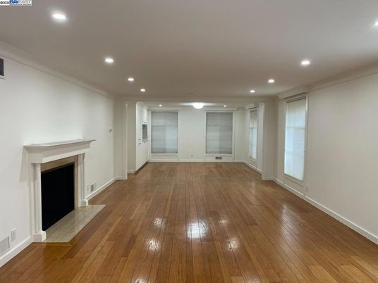 Empty room, Fireplace, Interior, Recessed Lighting, Wood Texture Flooring