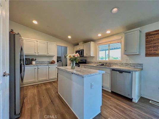 Interior, Kitchen, Recessed Lighting, Stainless Steel Appliances, Wood Texture Flooring