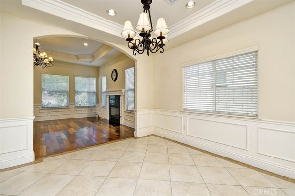 Chandelier, Empty room, Fireplace, Interior, Recessed Lighting, Wood Texture Flooring