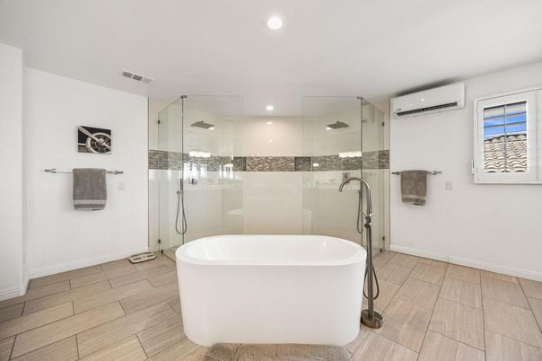 Bathroom, Free Standing Baths, Glass Shower, Interior, Recessed Lighting, Wood Texture Flooring