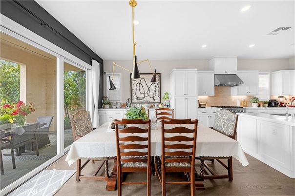 Dining room, Interior, Kitchen, Pendant Lights, Recessed Lighting, Stainless Steel Appliances, Wood Texture Flooring