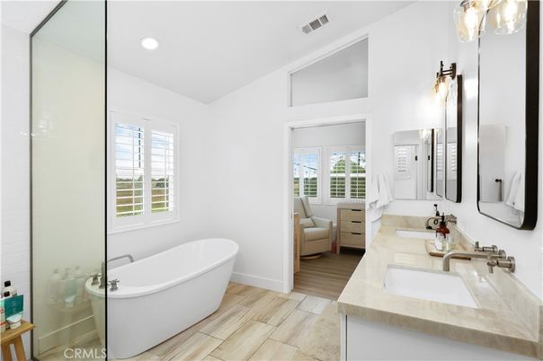 Bathroom, Dual Sink Vanities, Free Standing Baths, Interior, Recessed Lighting, Wood Texture Flooring