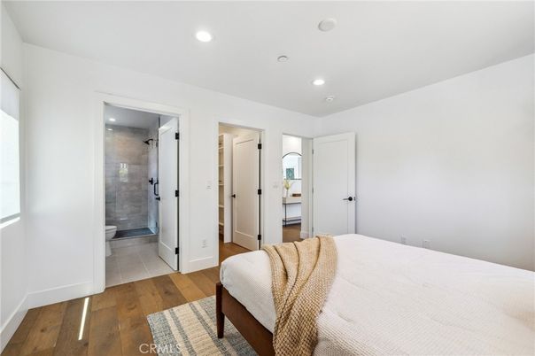 Bathroom, Bedroom, Glass Shower, Interior, Recessed Lighting, Wood Texture Flooring