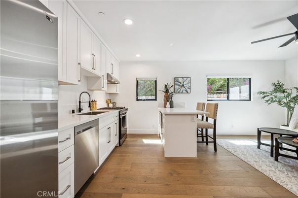 Dining room, Interior, Kitchen, Recessed Lighting, Stainless Steel Appliances, Wood Texture Flooring