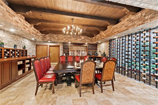 Chandelier, Dining room, Interior, Stone Walls, Wine Storage, Wooden Beams, Wooden Ceilings