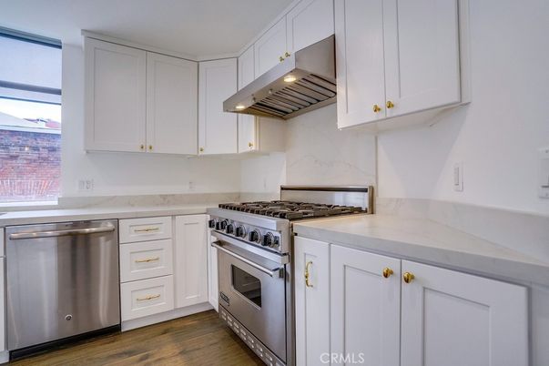 Interior, Kitchen, Marble Walls, Stainless Steel Appliances, Wood Texture Flooring