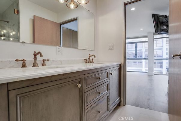Bathroom, Dual Sink Vanities, Interior, Recessed Lighting, Wood Texture Flooring