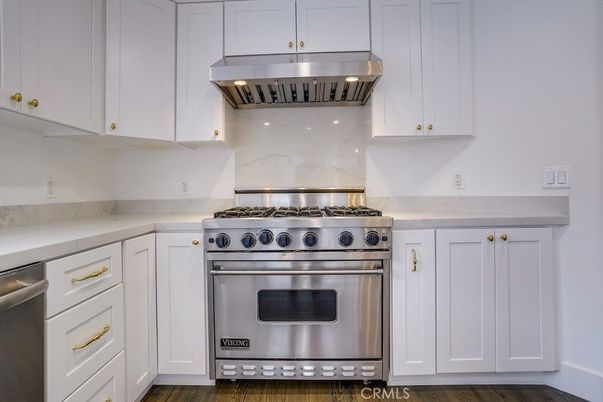 Interior, Kitchen, Marble Walls, Stainless Steel Appliances, Wood Texture Flooring