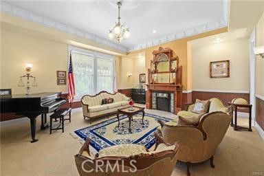Chandelier, Fireplace, Interior, Living room, Piano, Recessed Lighting
