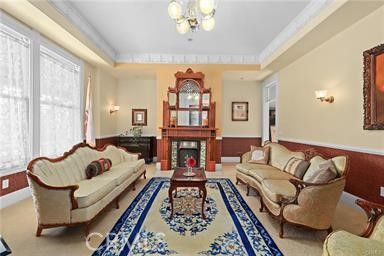 Chandelier, Fireplace, Interior, Living room