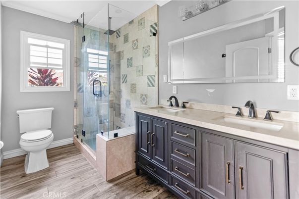 Bathroom, Dual Sink Vanities, Glass Shower, Interior, Wood Texture Flooring