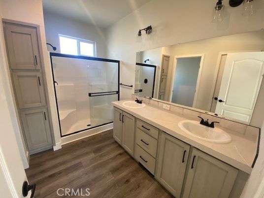Bathroom, Dual Sink Vanities, Glass Shower, Interior, Wood Texture Flooring
