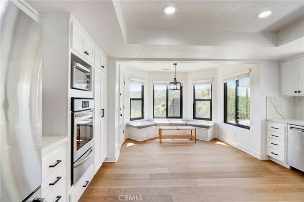 Interior, Kitchen, Marble Walls, Pendant Lights, Recessed Lighting, Wood Texture Flooring