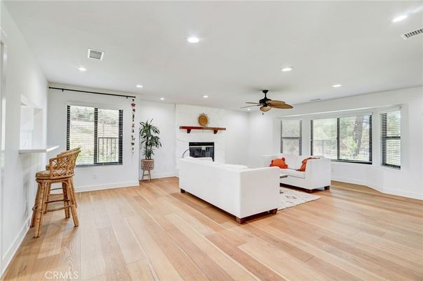 Fireplace, Interior, Living room, Recessed Lighting, Wood Texture Flooring