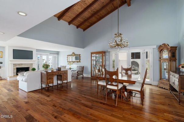 Chandelier, Dining room, Fireplace, Interior, Living room, Pendant Lights, Recessed Lighting, Wooden Beams, Wooden Ceilings, Wood Texture Flooring