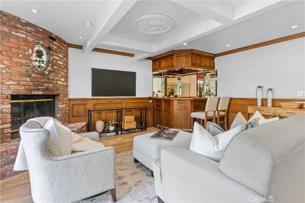 Fireplace, Interior, Living room, Recessed Lighting, Stone Walls, Wood Texture Flooring