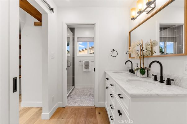 Bathroom, Dual Sink Vanities, Glass Shower, Interior, Wood Texture Flooring
