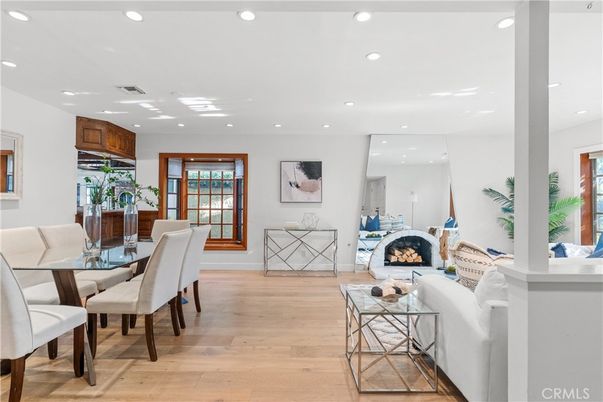 Dining room, Fireplace, Interior, Living room, Recessed Lighting, Wood Texture Flooring