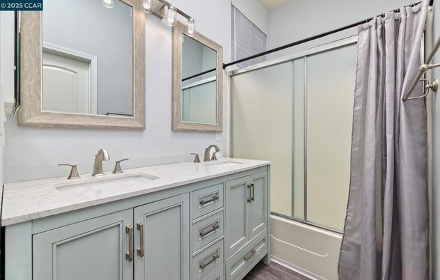 Bathroom, Dual Sink Vanities, Glass Shower, Interior, Wood Texture Flooring
