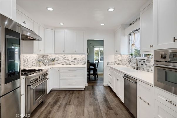 Interior, Kitchen, Recessed Lighting, Stainless Steel Appliances, Wood Texture Flooring