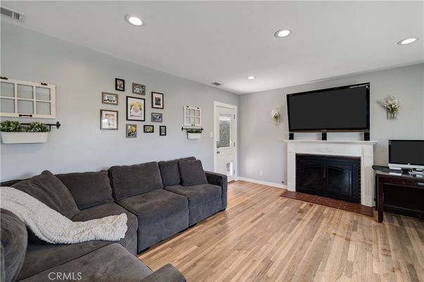 Fireplace, Interior, Living room, Recessed Lighting, Wood Texture Flooring