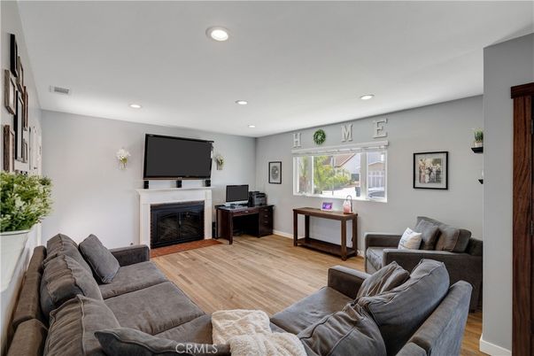 Fireplace, Interior, Living room, Recessed Lighting, Wood Texture Flooring