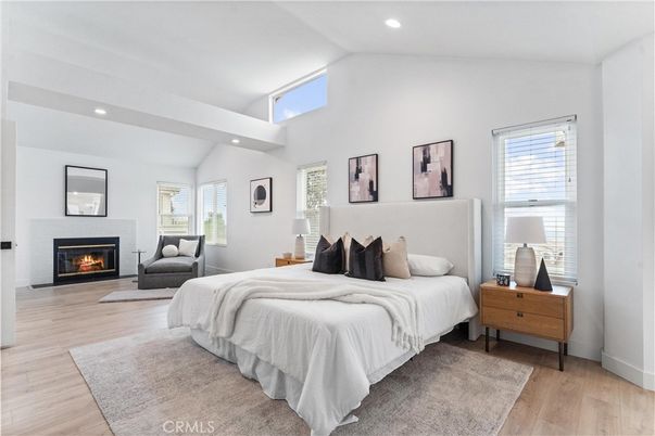 Bedroom, Fireplace, Interior, Recessed Lighting, Wood Texture Flooring