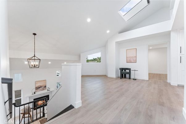Fireplace, Interior, Pendant Lights, Recessed Lighting, Wood Texture Flooring