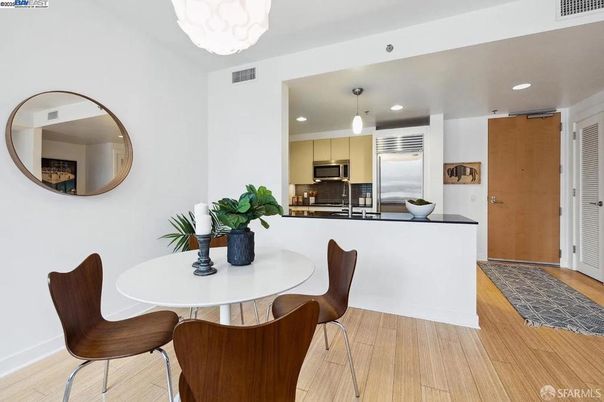 Chandelier, Dining room, Interior, Kitchen, Pendant Lights, Recessed Lighting, Stainless Steel Appliances, Wood Texture Flooring