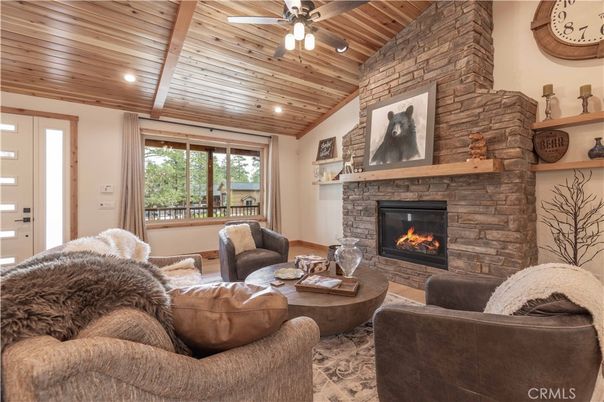 Fireplace, Interior, Living room, Recessed Lighting, Stone Walls, Wooden Beams, Wooden Ceilings