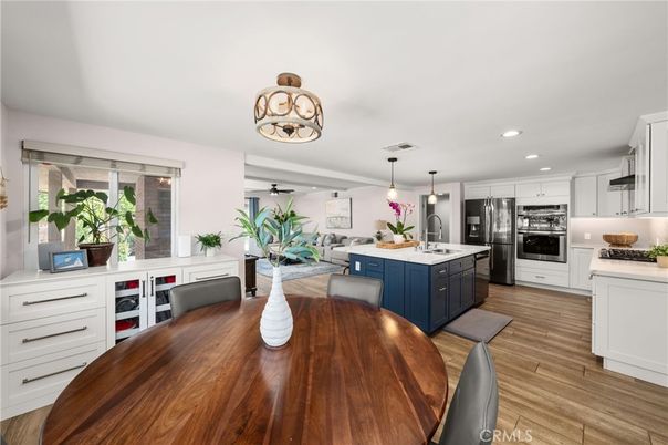 Dining room, Interior, Kitchen, Living room, Pendant Lights, Recessed Lighting, Stainless Steel Appliances, Wood Texture Flooring