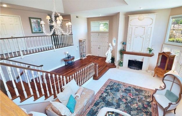 Chandelier, Fireplace, Interior, Living room, Recessed Lighting, Wood Texture Flooring