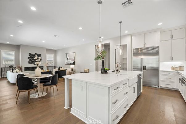 Dining room, Interior, Kitchen, Living room, Pendant Lights, Recessed Lighting, Stainless Steel Appliances, Wood Texture Flooring