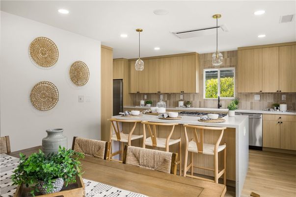Dining room, Interior, Kitchen, Pendant Lights, Recessed Lighting, Stainless Steel Appliances, Wood Texture Flooring