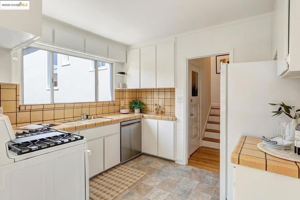 Interior, Kitchen, Tile Countertops, Wood Texture Flooring