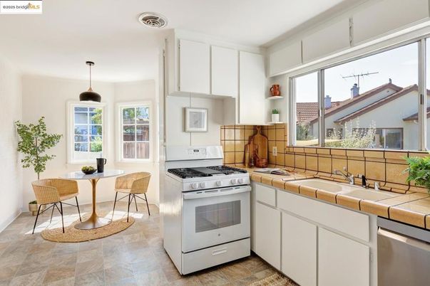 Dining room, Interior, Kitchen, Pendant Lights, Stainless Steel Appliances, Tile Countertops