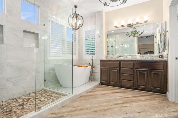 Bathroom, Dual Sink Vanities, Free Standing Baths, Glass Shower, Interior, Pendant Lights, Wood Texture Flooring